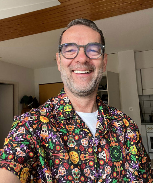 Mexican skulls celebrating the Day of the Dead Unisex button shirt. A happy customer