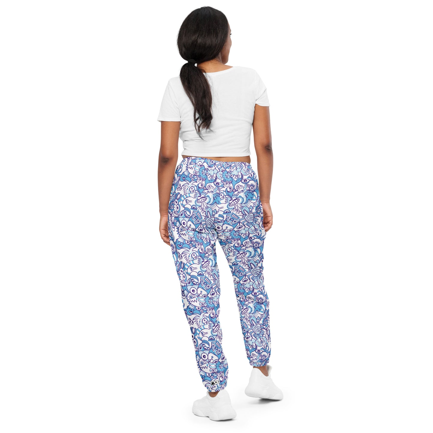 Whimsical Blue Doodle Critterscape pattern design - Unisex track pants. Back view