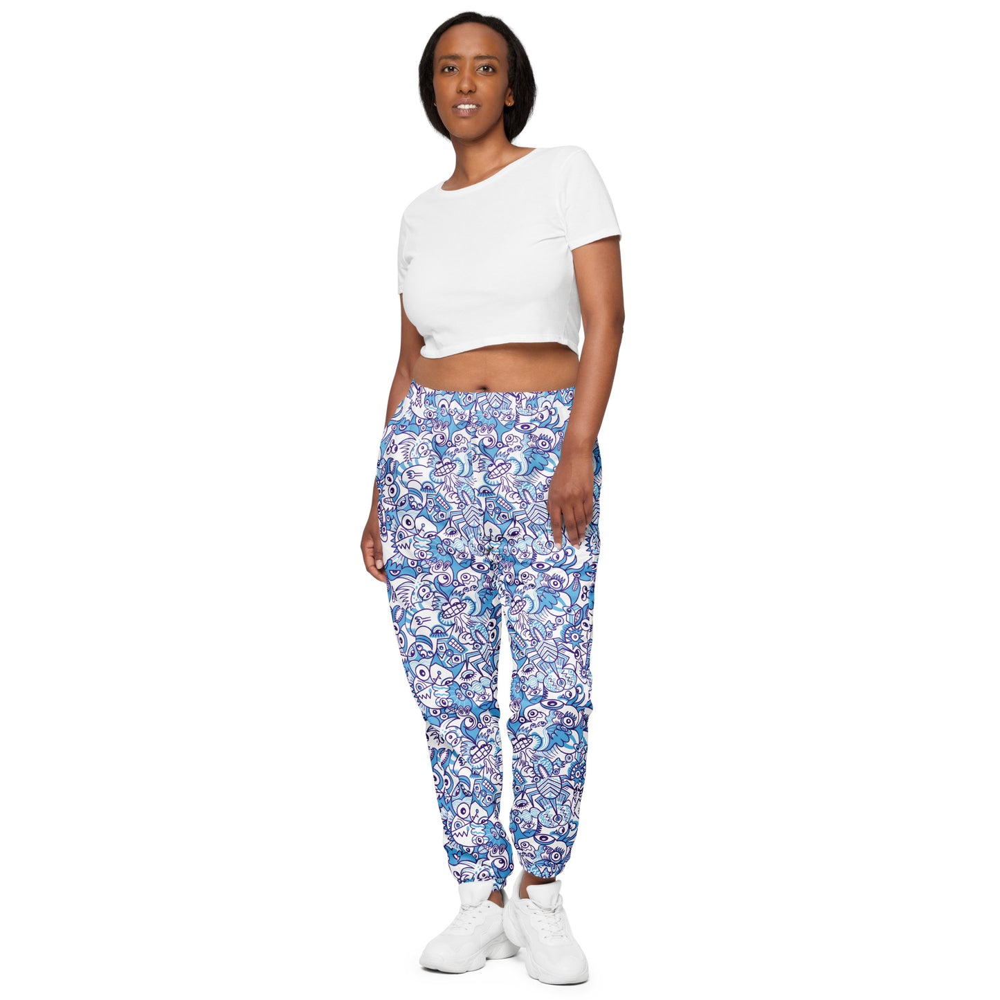 Whimsical Blue Doodle Critterscape pattern design - Unisex track pants. Front view