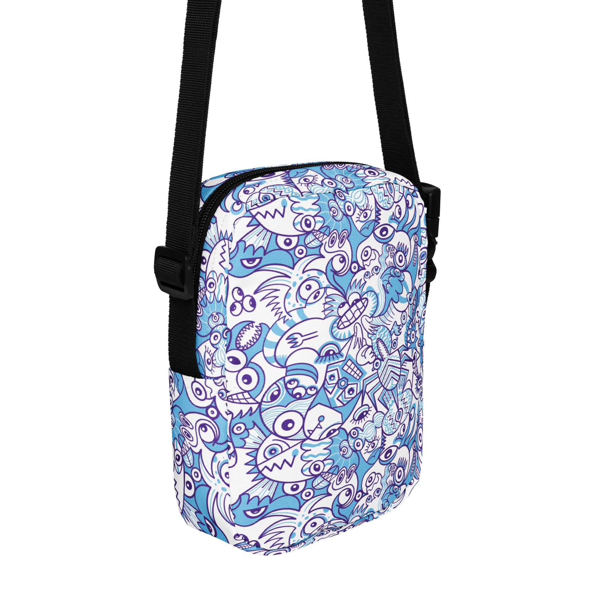 Whimsical Blue Doodle Critterscape pattern design - Utility crossbody bag. Back view