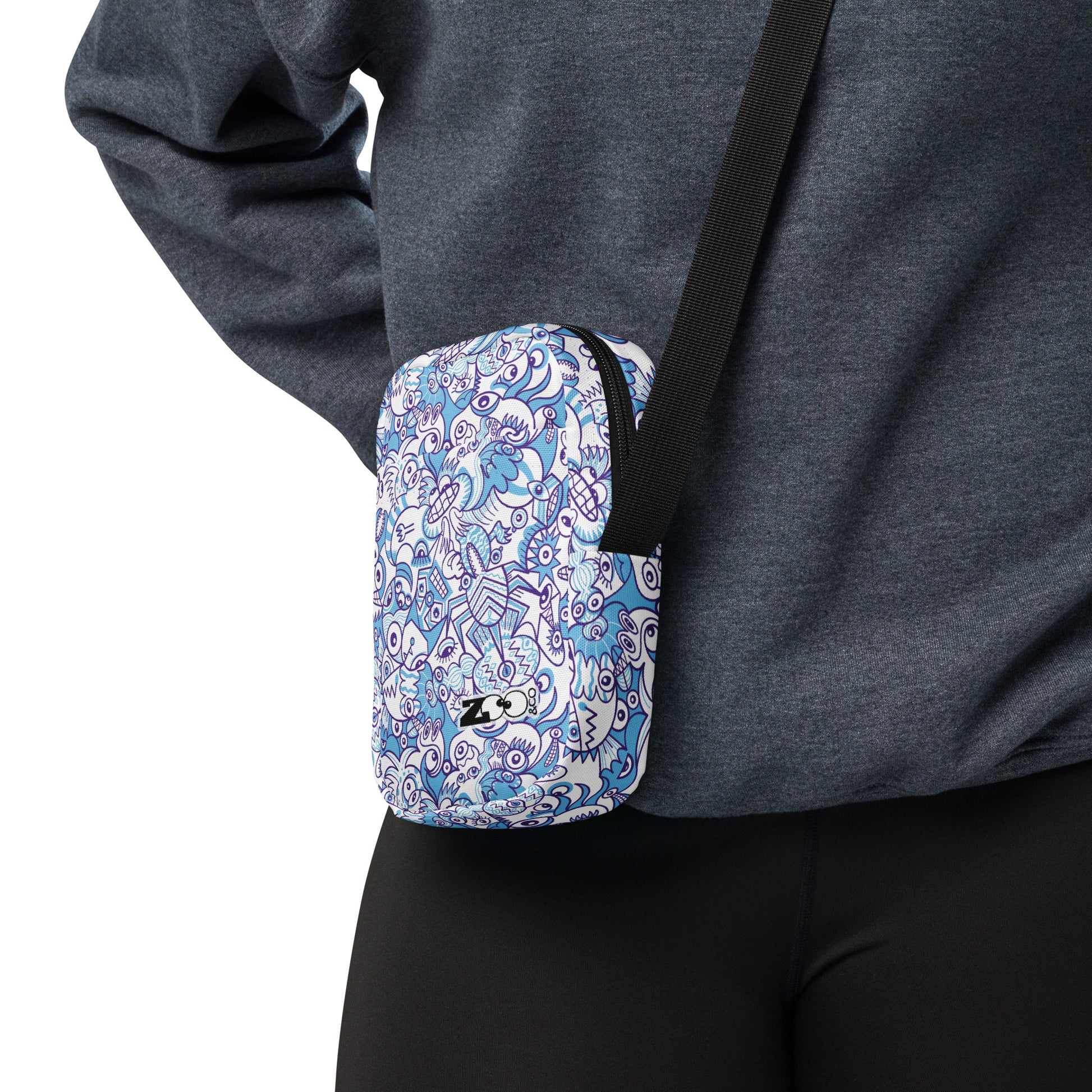 Whimsical Blue Doodle Critterscape pattern design - Utility crossbody bag. Lifestyle