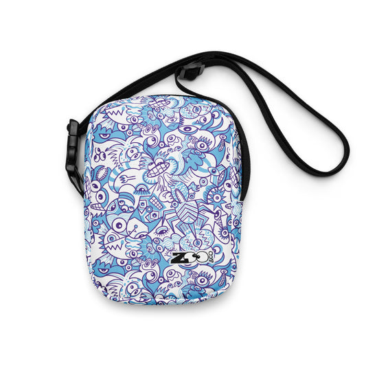 Whimsical Blue Doodle Critterscape pattern design - Utility crossbody bag. Front view