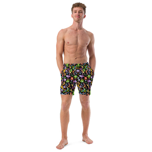Ocean critters pattern mandala Men's swim trunks. Front view