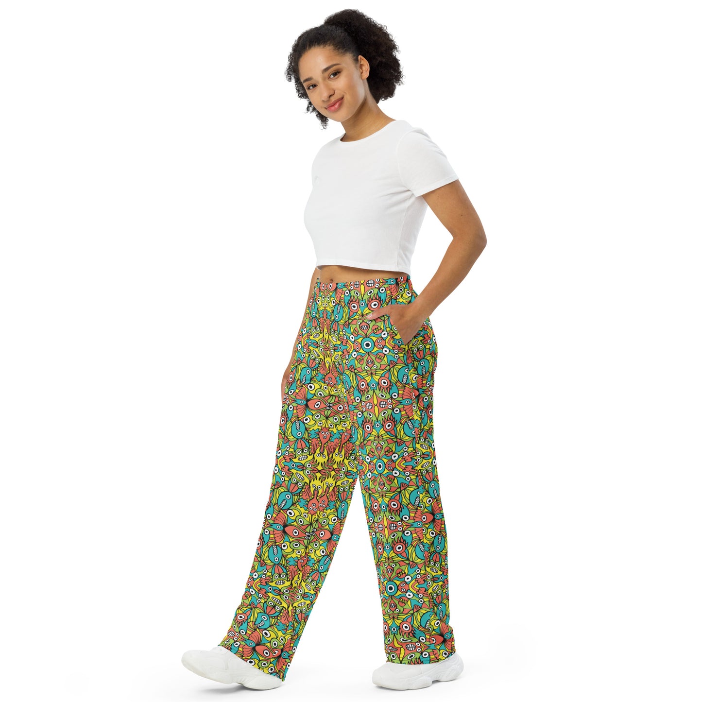 Alien monsters pattern design All-over print unisex wide-leg pants. Side view