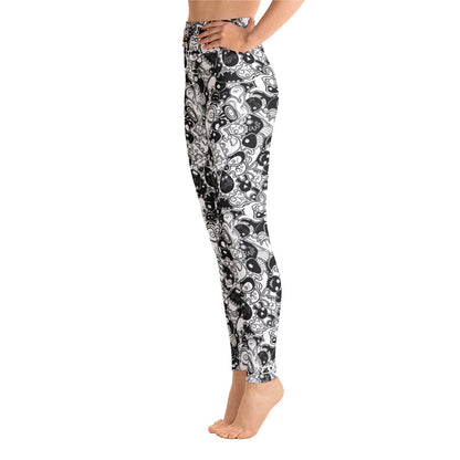 Joyful crowd of black and white doodle creatures Yoga Leggings. Side view