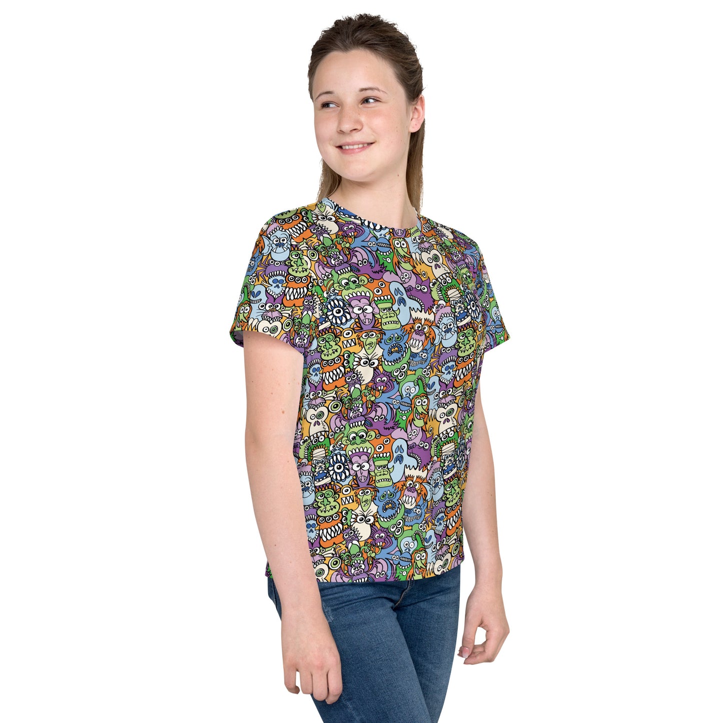All the spooky Halloween monsters in a pattern design Youth crew neck t-shirt. Girl wearing All-over print T-Shirt