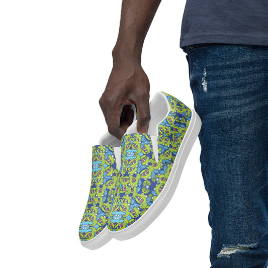 Winged little blue monster pattern art Men’s slip-on canvas shoes. Lifestyle