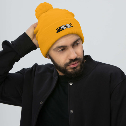 Zoo&co branded Pom-Pom Beanie. Fight the cold winter in style. Gold. Man wearing Zoo&co's pom-pom beanie