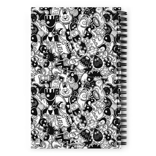 Joyful crowd of black and white doodle creatures Spiral notebook. Back view