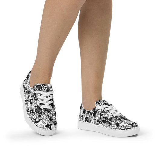 Joyful crowd of black and white doodle creatures Women’s lace-up canvas shoes. Lifestyle