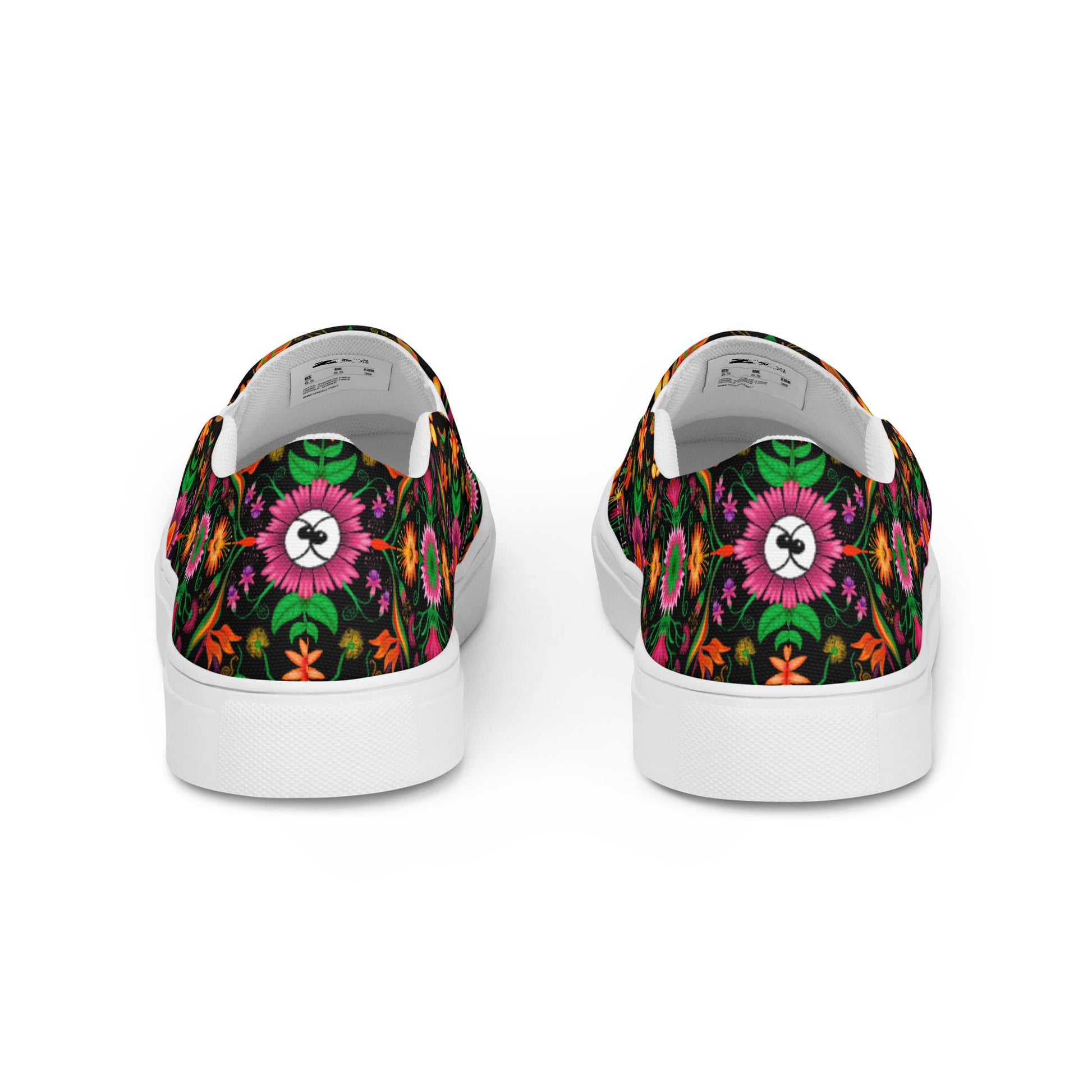 Wild flowers in a luxuriant jungle Women’s slip-on canvas shoes. Back view