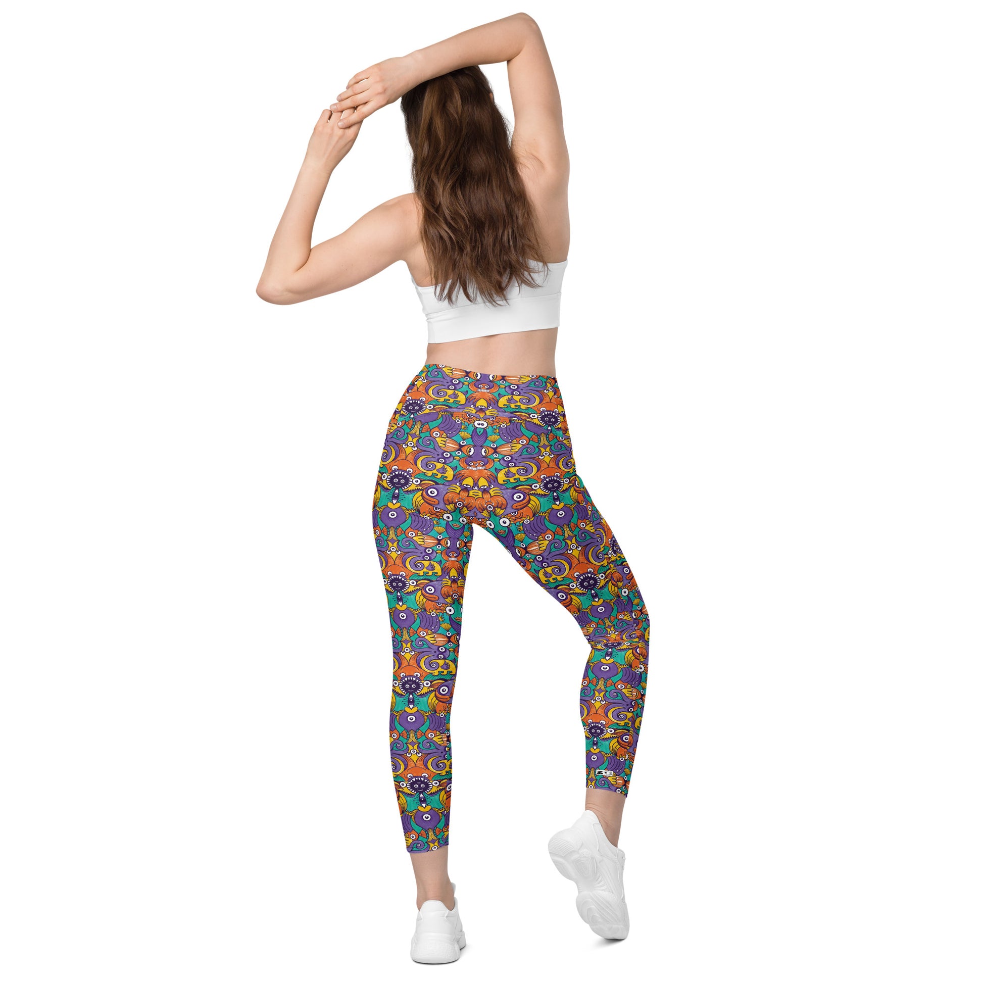 Dive into Whimsical Waters: An Undersea Odyssey - Crossover leggings with pockets. Back view