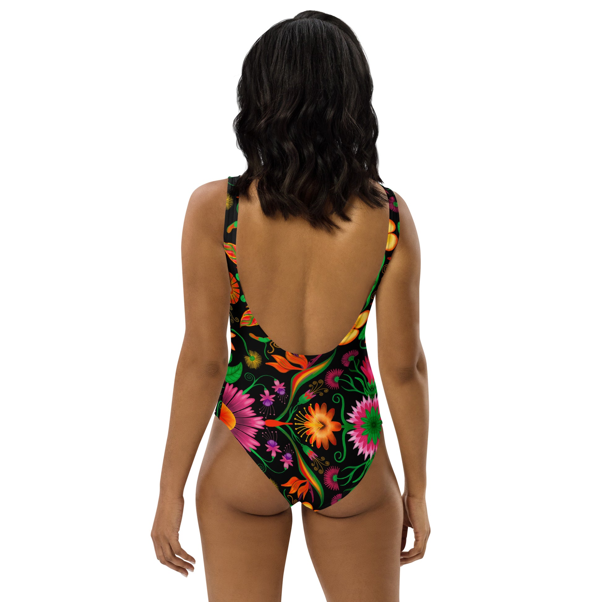 Wild flowers in a luxuriant jungle One-Piece Swimsuit. Back view