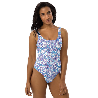 Whimsical Blue Doodle Critterscape pattern design One-Piece Swimsuit. front view