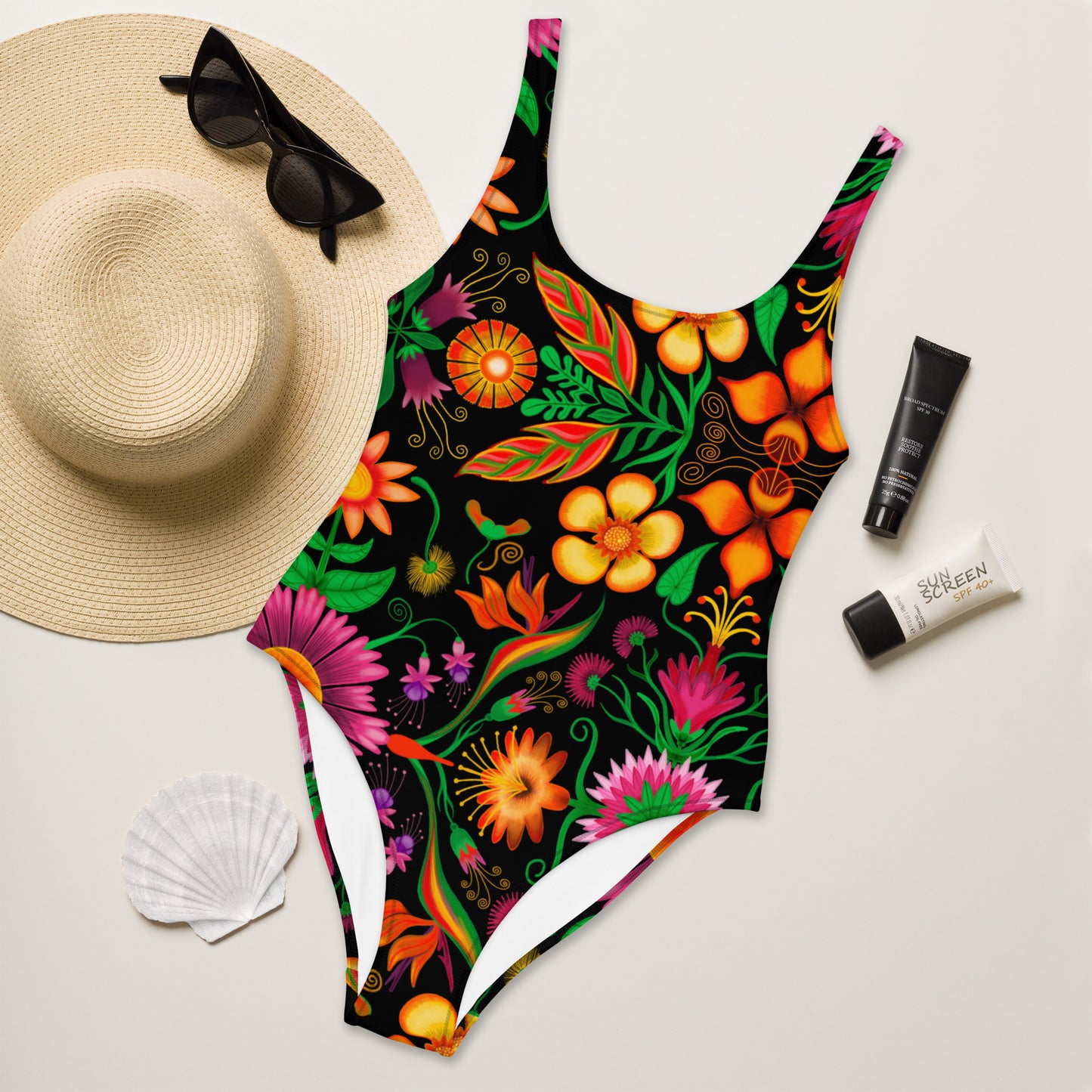 Wild flowers in a luxuriant jungle One-Piece Swimsuit. Flat lifestyle