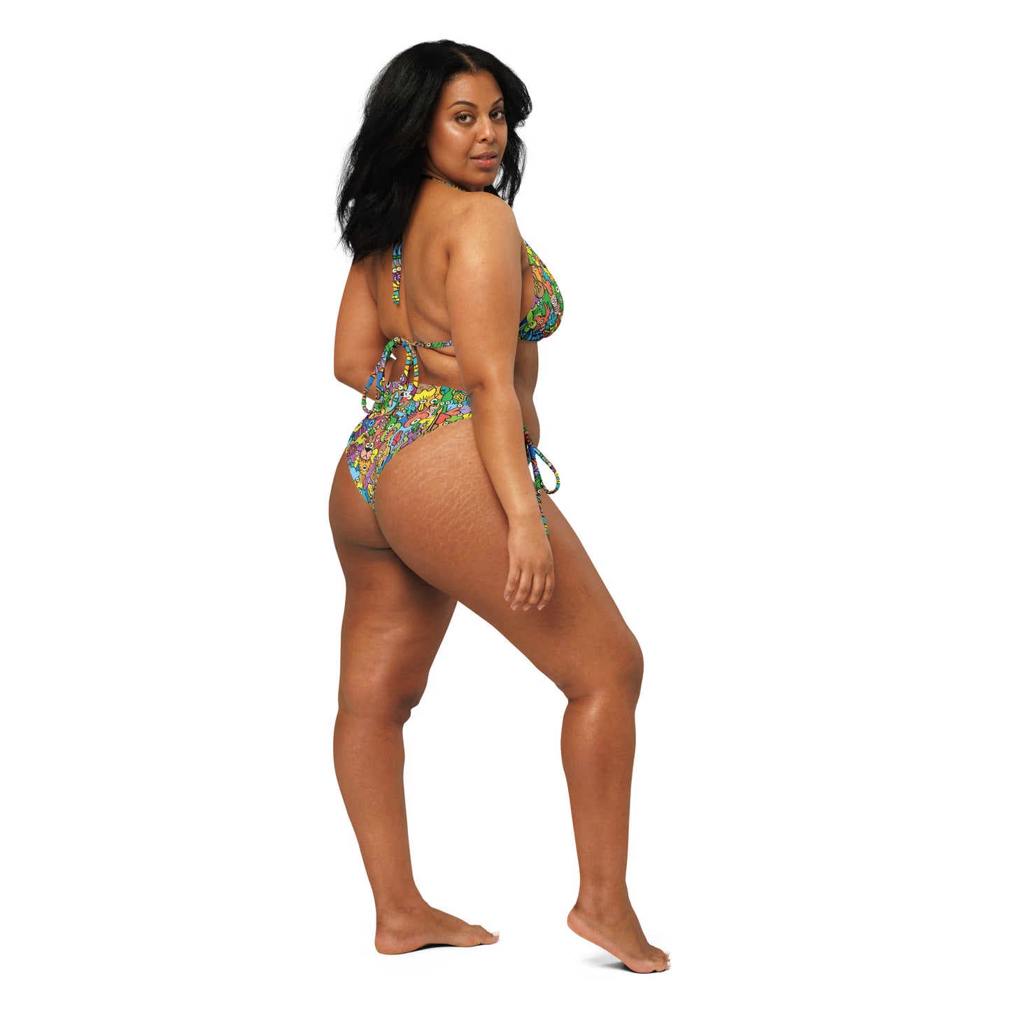 Cheerful crowd enjoying a lively carnival All-over print recycled string bikini. Back view