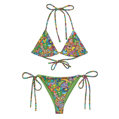 Cheerful crowd enjoying a lively carnival All-over print recycled string bikini. Flat view