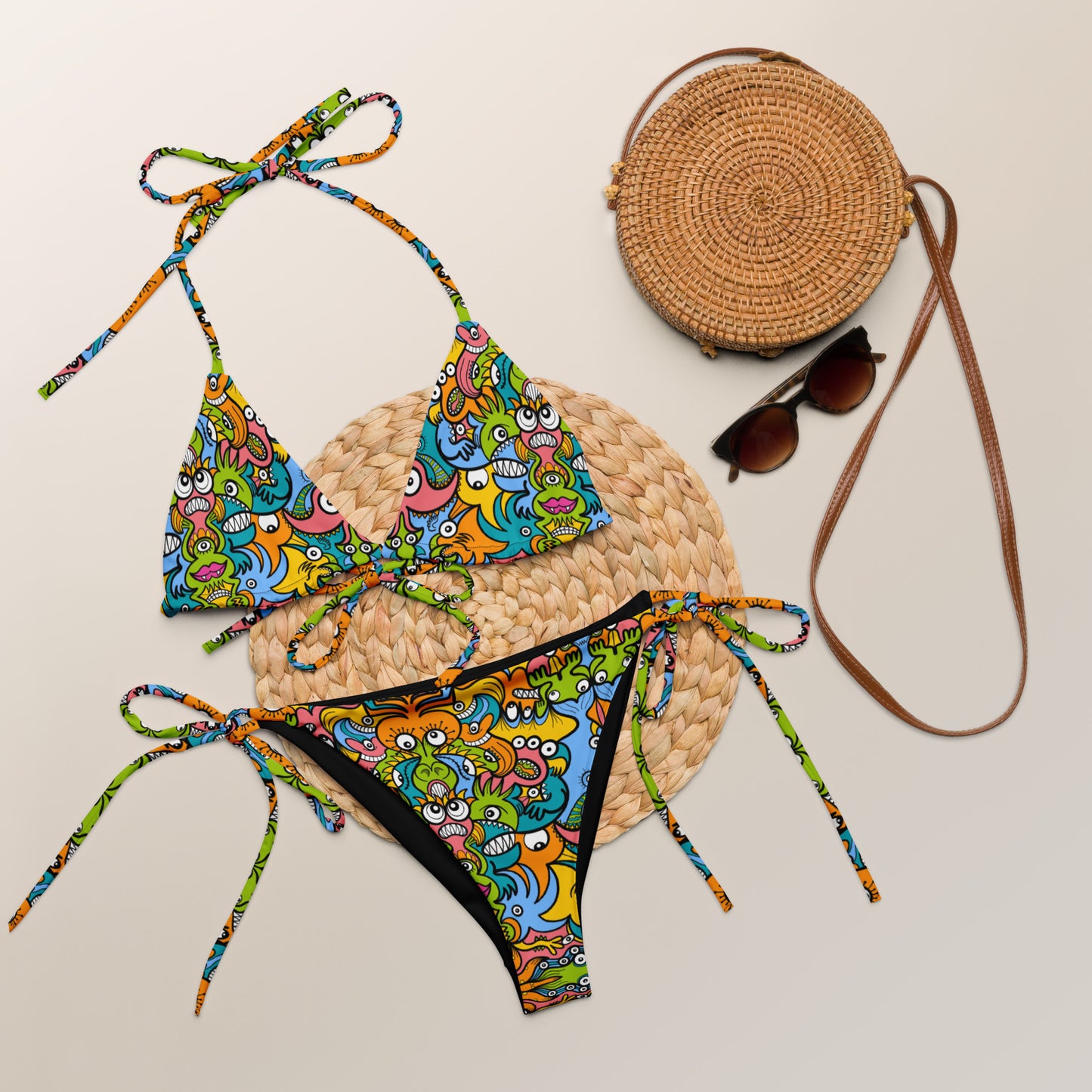 Enchantimals Fantasy Doodle Bikini:  All-over print recycled string edition. Lifestyle. Front view