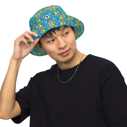 Exotic birds tropical pattern Reversible bucket hat. Front view