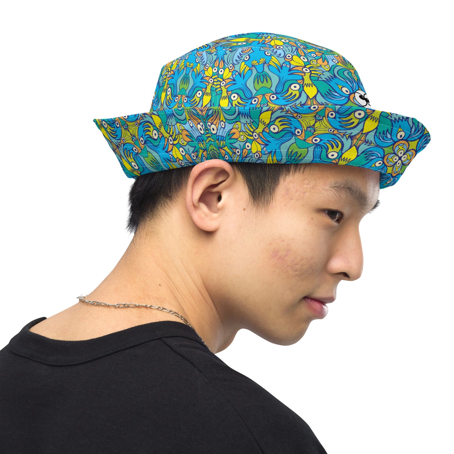 Exotic birds tropical pattern Reversible bucket hat. Side view