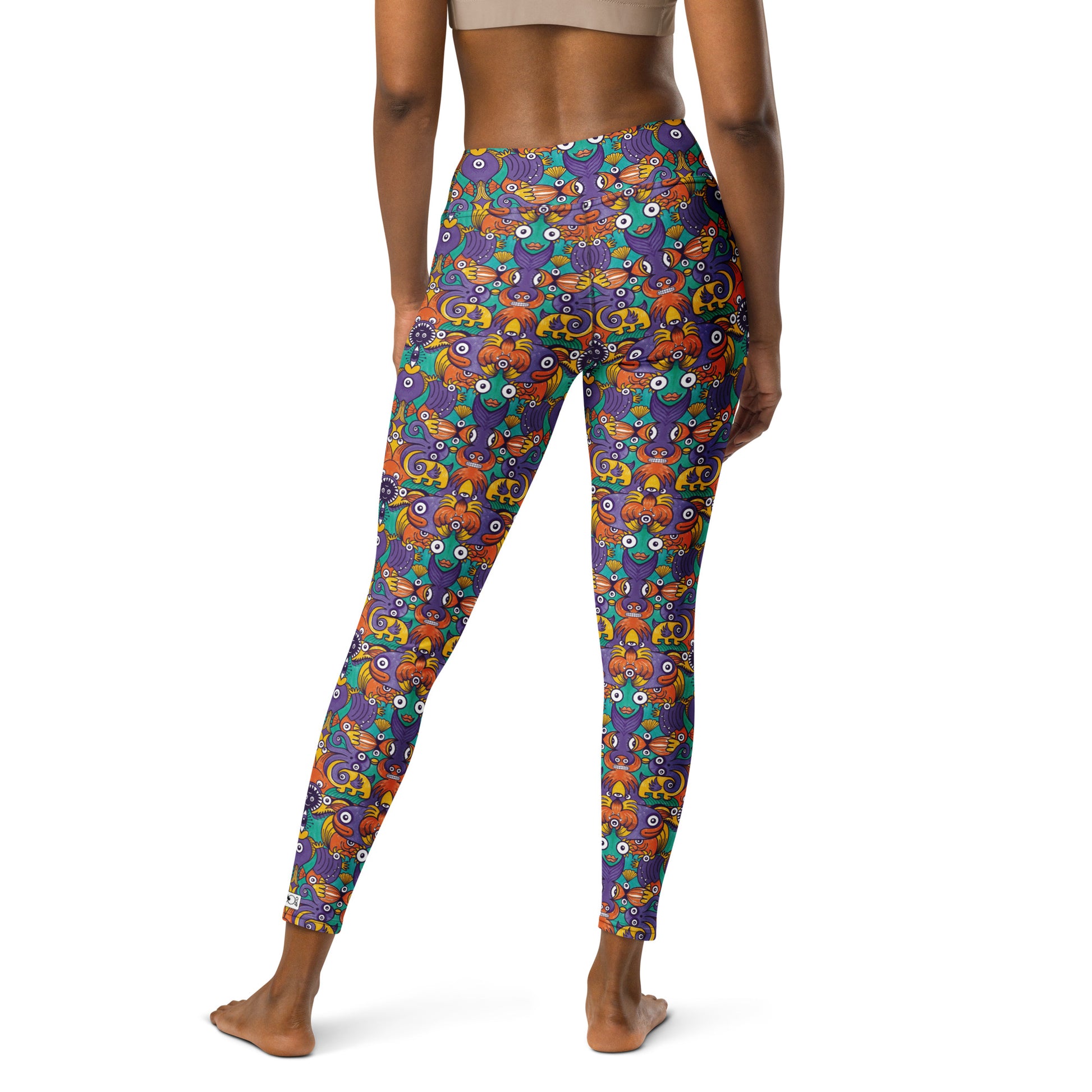 Dive into Whimsical Waters: An Undersea Odyssey - Yoga Leggings. Back view