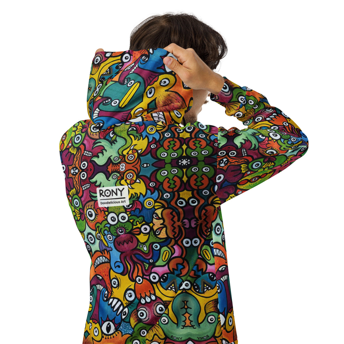 Man wearing Doodle Planet zip hoodie from behind, lifting the hood to reveal colorful creature art and RONY branding.