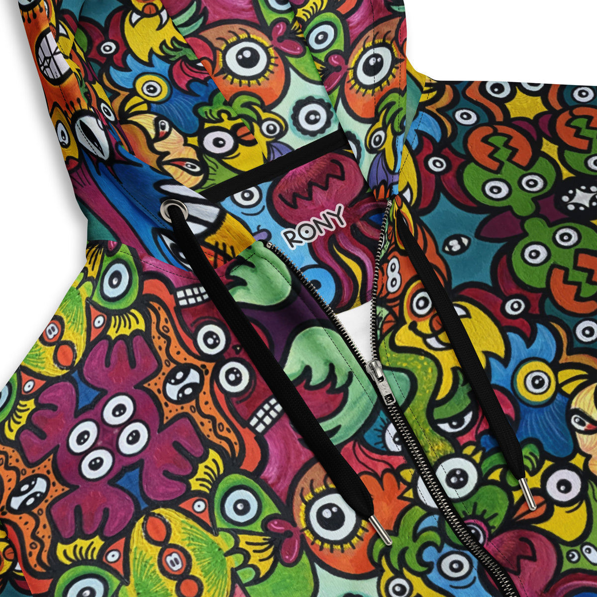 Close-up of Doodle Planet hoodie showing colorful creature artwork, metal zipper, black drawstrings, and RONY neck branding.