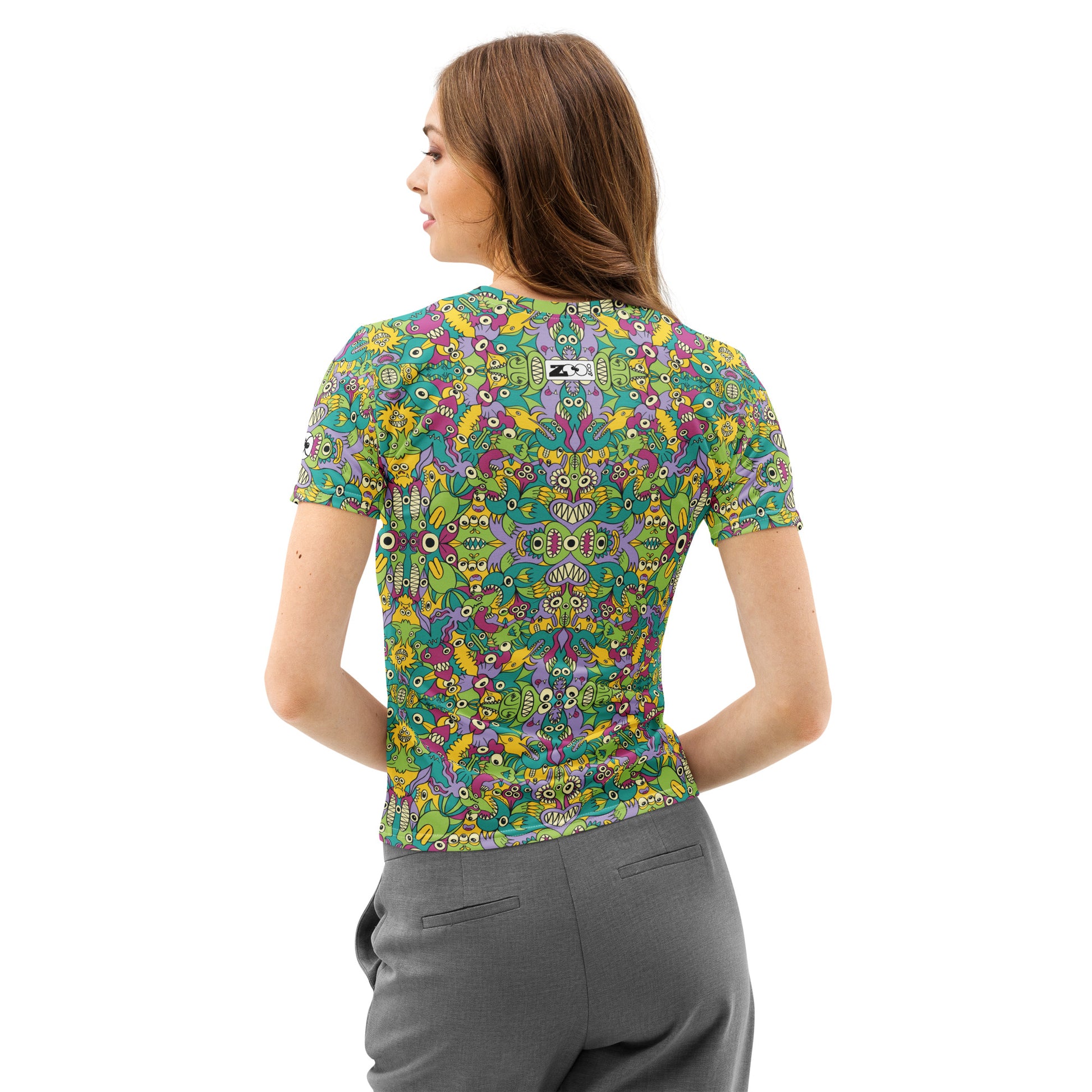 It's Life but Not as We Know It Women's cotton t-shirt – lifestyle back view featuring alien creatures all-over print doodle pattern in teal, green, yellow and purple

