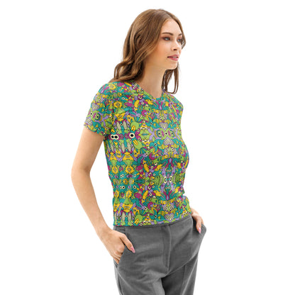 It's Life but Not as We Know It Women's cotton t-shirt – lifestyle right front view featuring alien creatures all-over print doodle pattern in teal, green, yellow and purple

