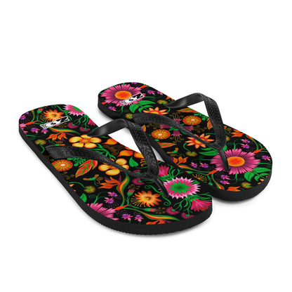 Wild flowers in a luxuriant jungle Flip-Flops. Overview