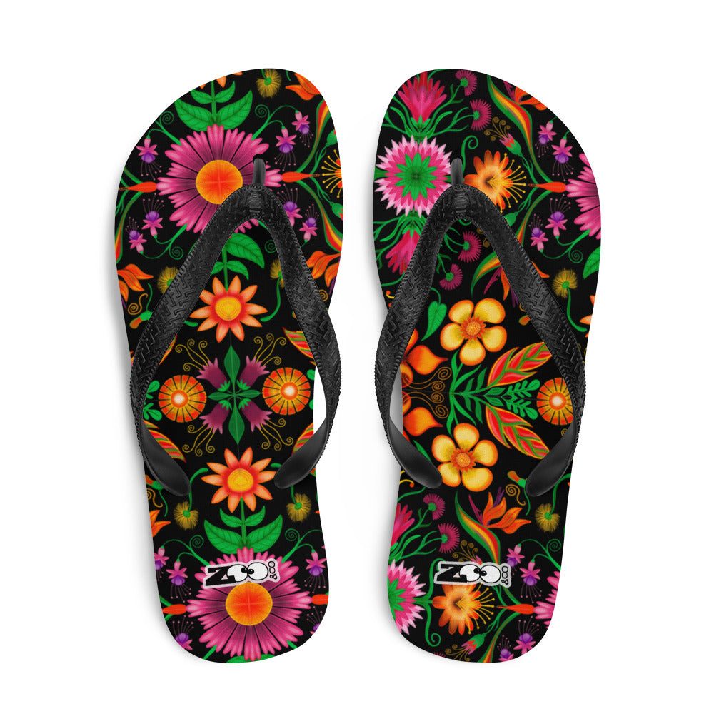 Wild flowers in a luxuriant jungle Flip-Flops. Top view