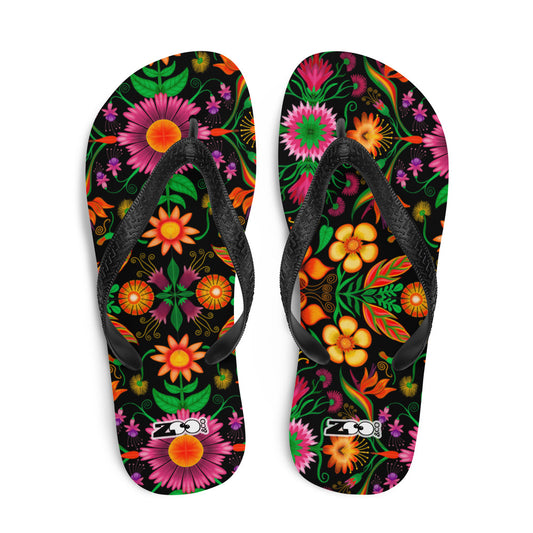 Wild flowers in a luxuriant jungle Flip-Flops. Top view