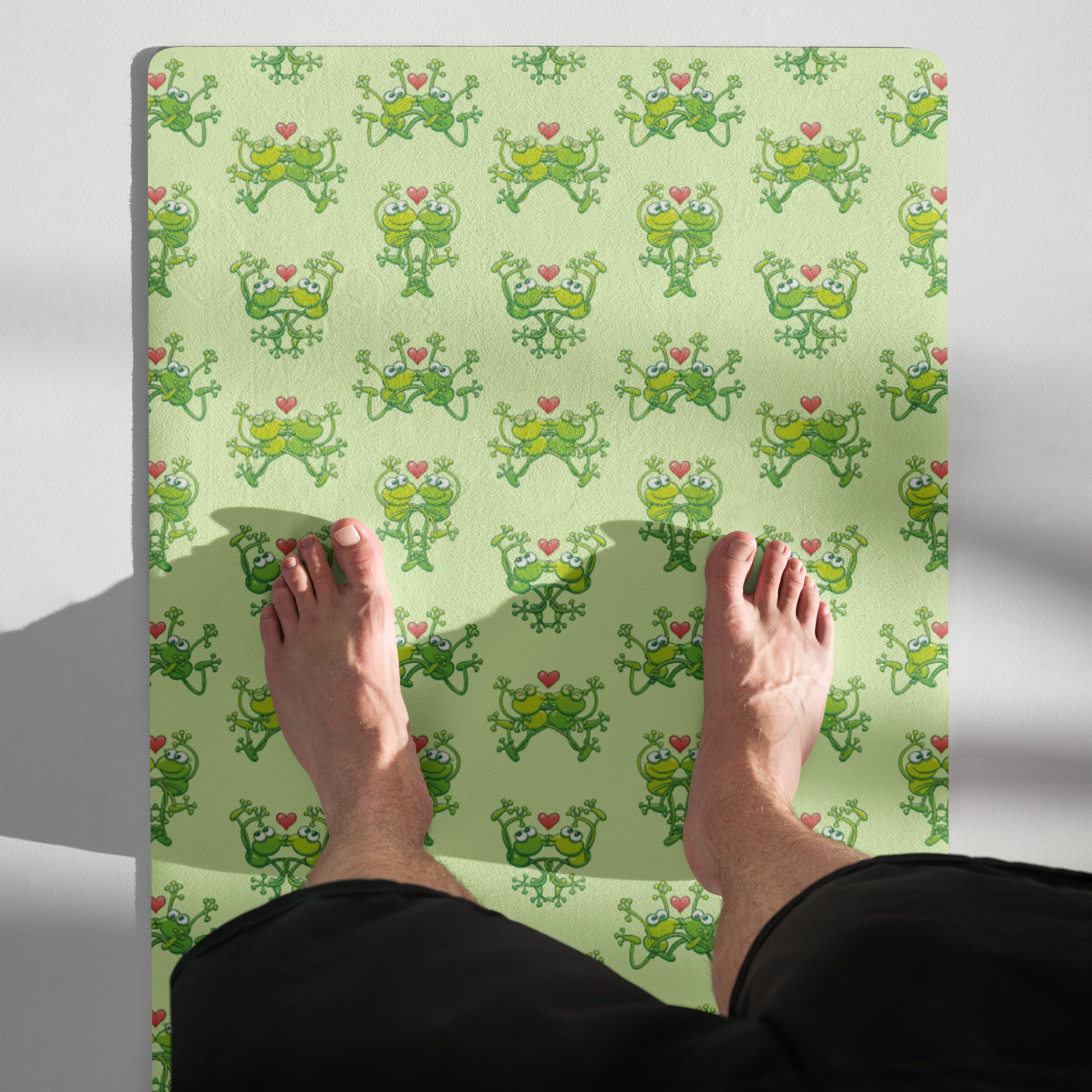 Green frogs are calling for love Yoga mat. Top view