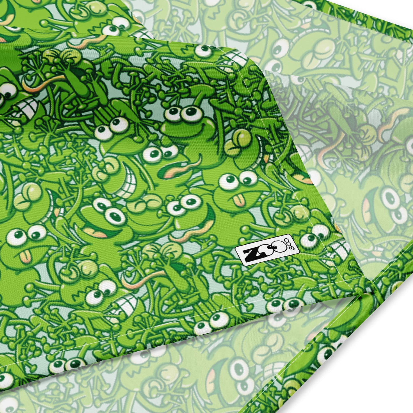 A tangled army of happy green frogs appears when the rain ends All-over print bandana. Product detail