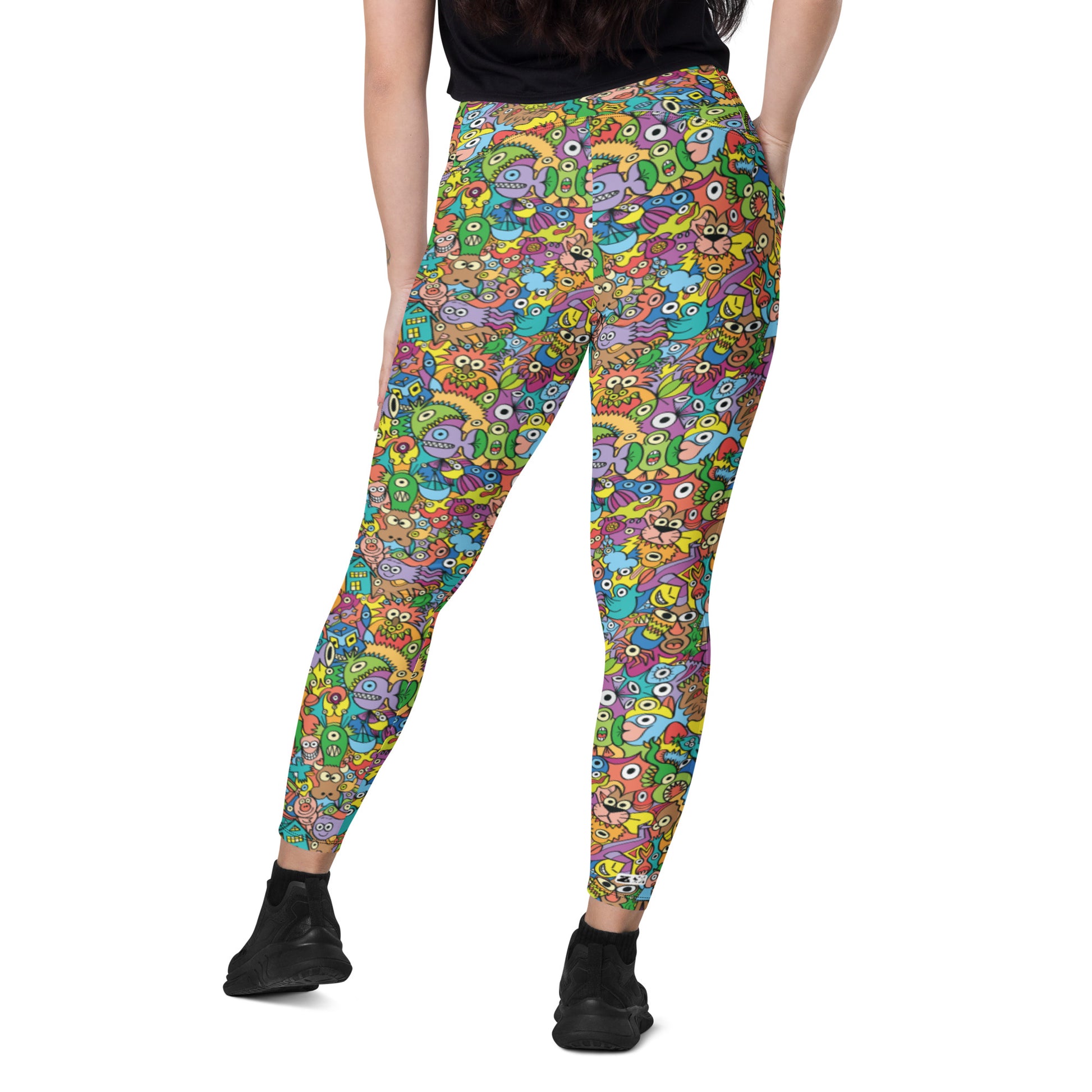 Cheerful crowd enjoying a lively carnival Crossover leggings with pockets. Back view