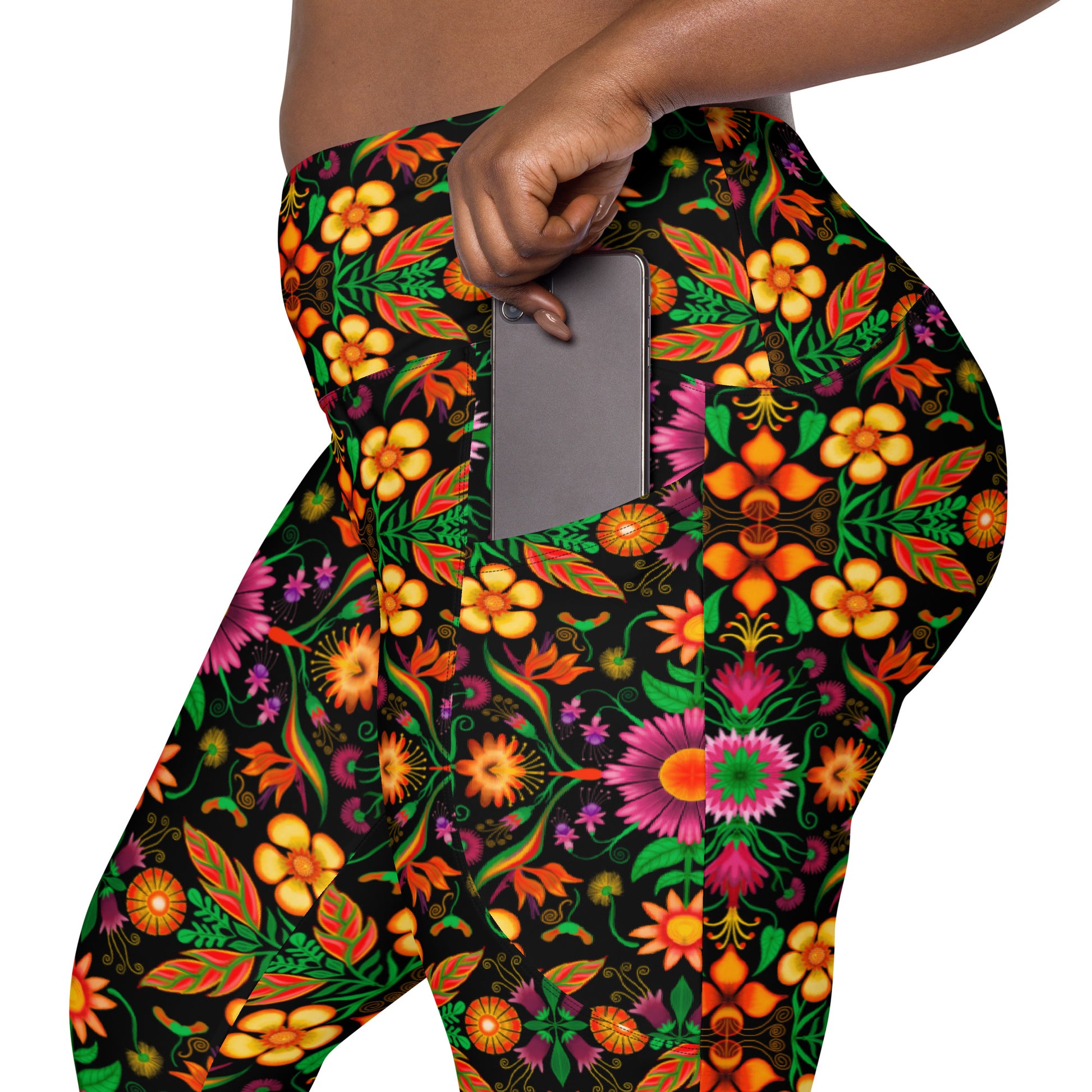 Wild flowers in a luxuriant jungle Crossover leggings with pockets. Pocket details