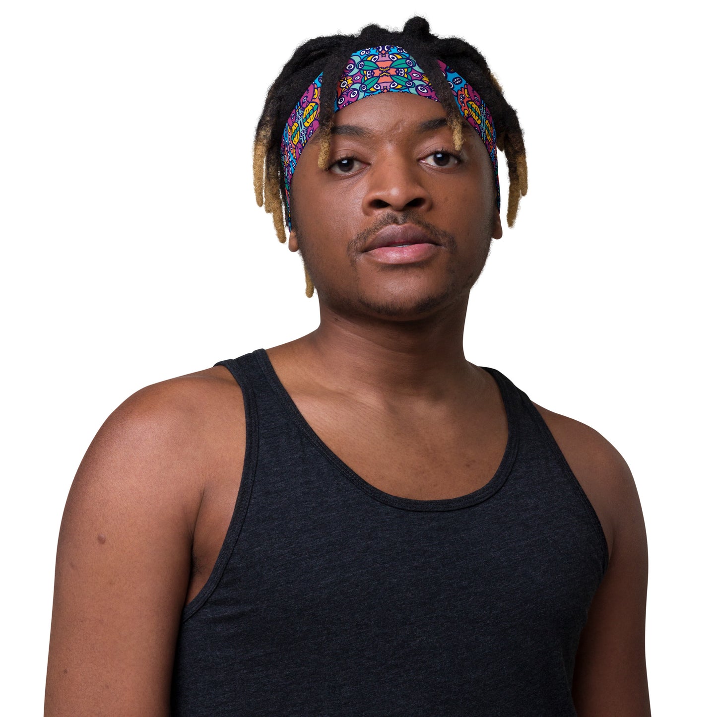 Cool man wearing Headband All-over printed with Whimsical design featuring multicolor critters from another world