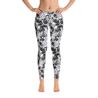Joyful crowd of black and white doodle creatures Leggings. Front view