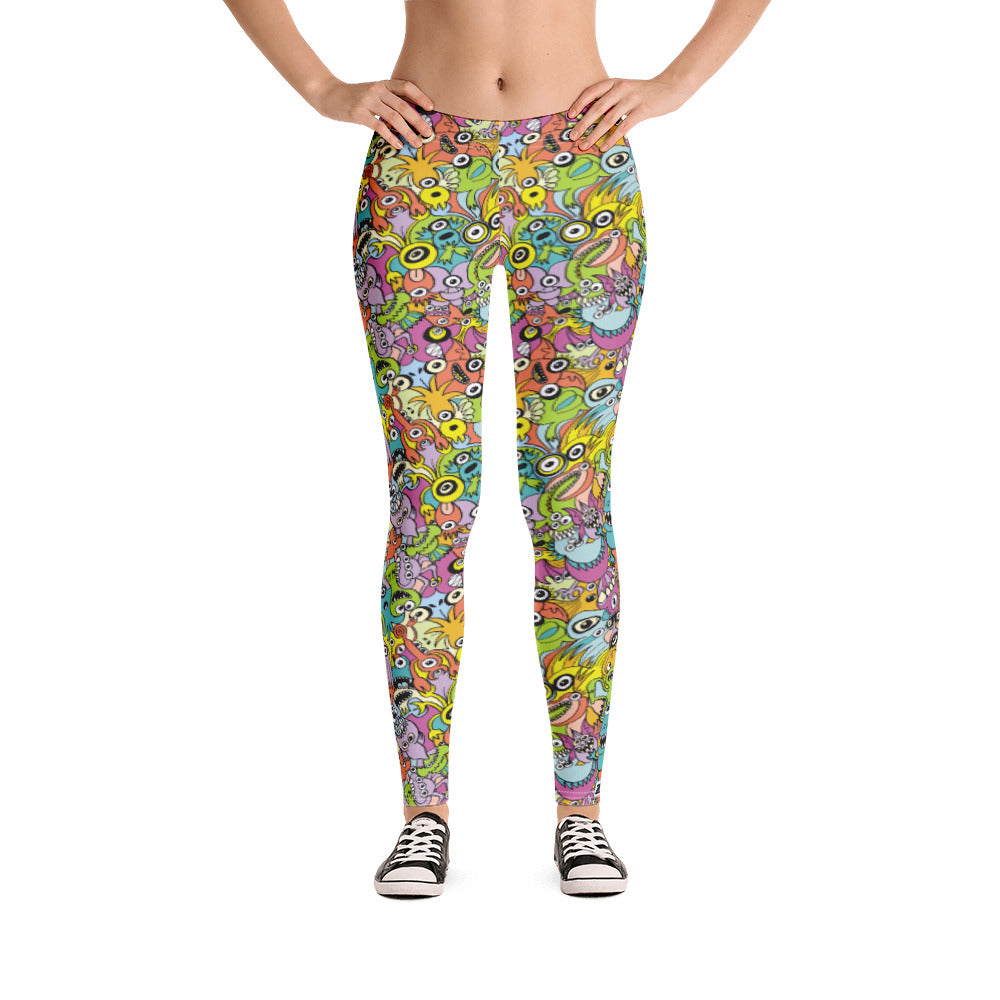 Funny monsters fighting for the best spot for a pattern design Leggings. Front view