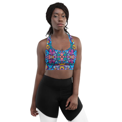 Whimsical design featuring colorful critters from another world Longline sports bra. Front view