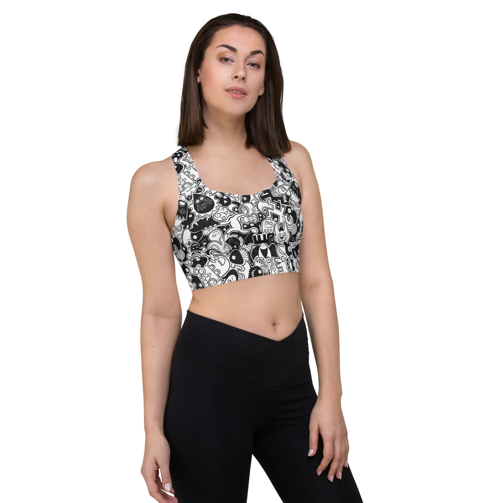 Joyful crowd of black and white doodle creatures Longline sports bra. Front view
