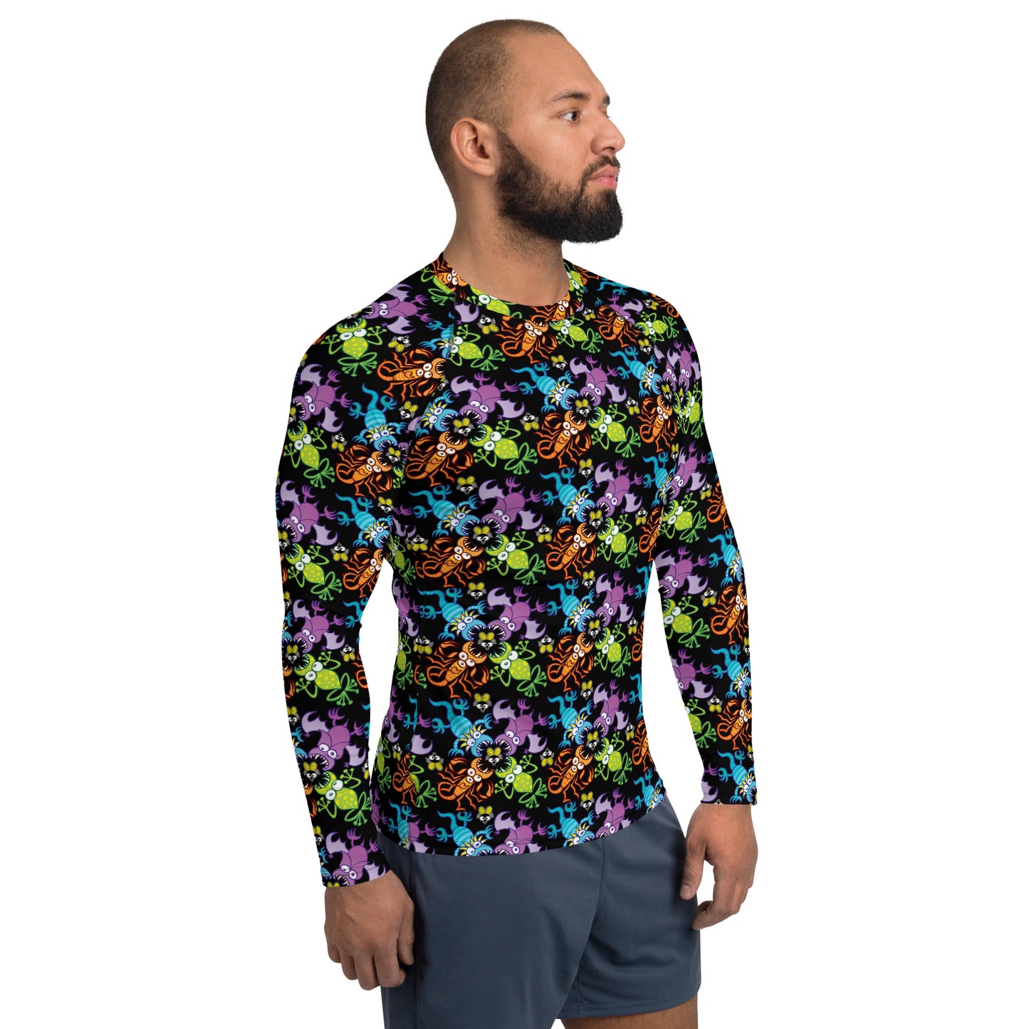 Athletic man wearing Men's Rash Guard All over printed with Bat, scorpion, lizard and frog fighting over an unlucky fly