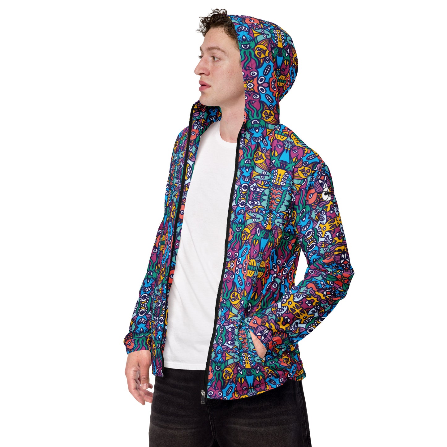 Whimsical design featuring multicolor critters from another world Men’s windbreaker. Side view