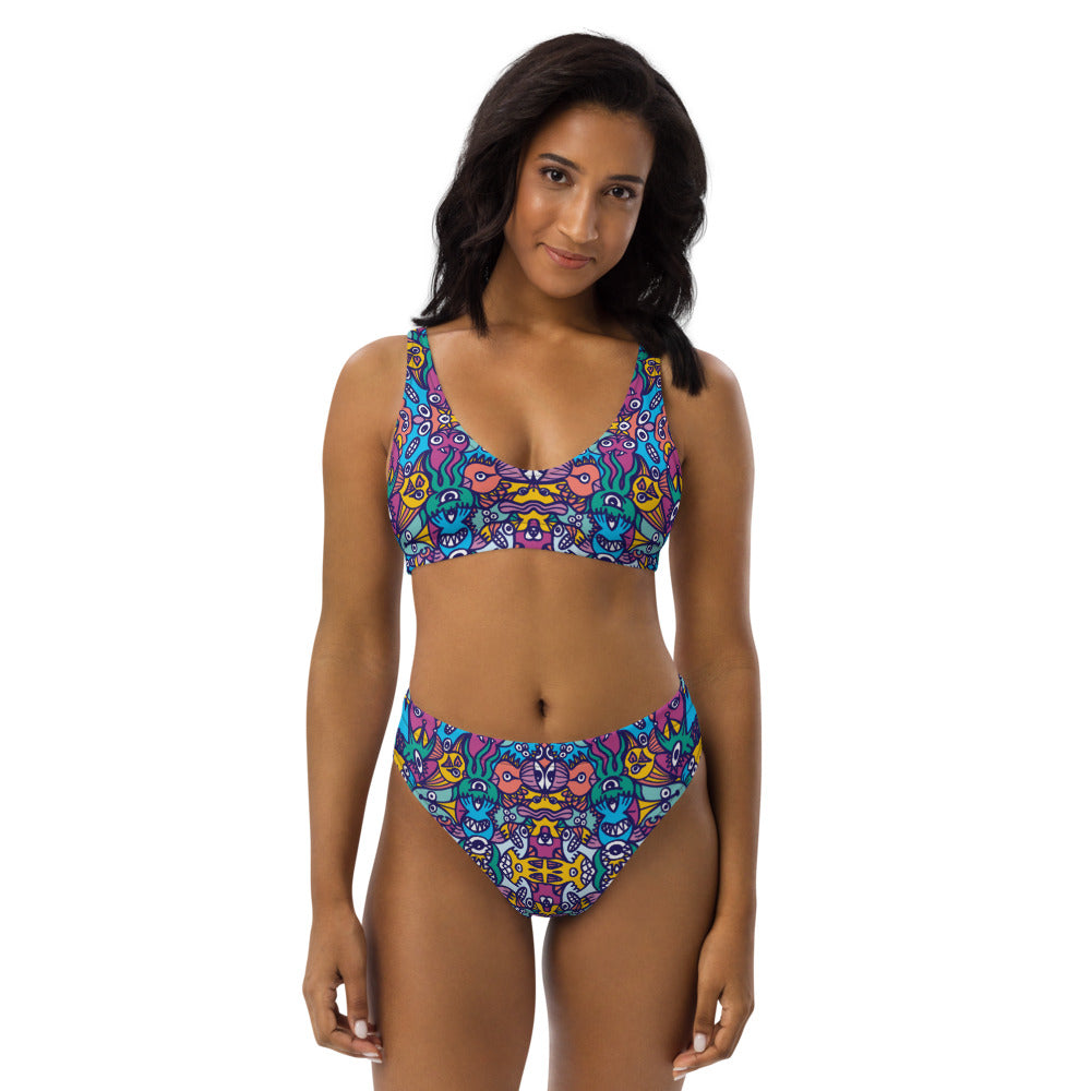 Whimsical design featuring multicolor critters from another world Recycled high-waisted bikini. Front view