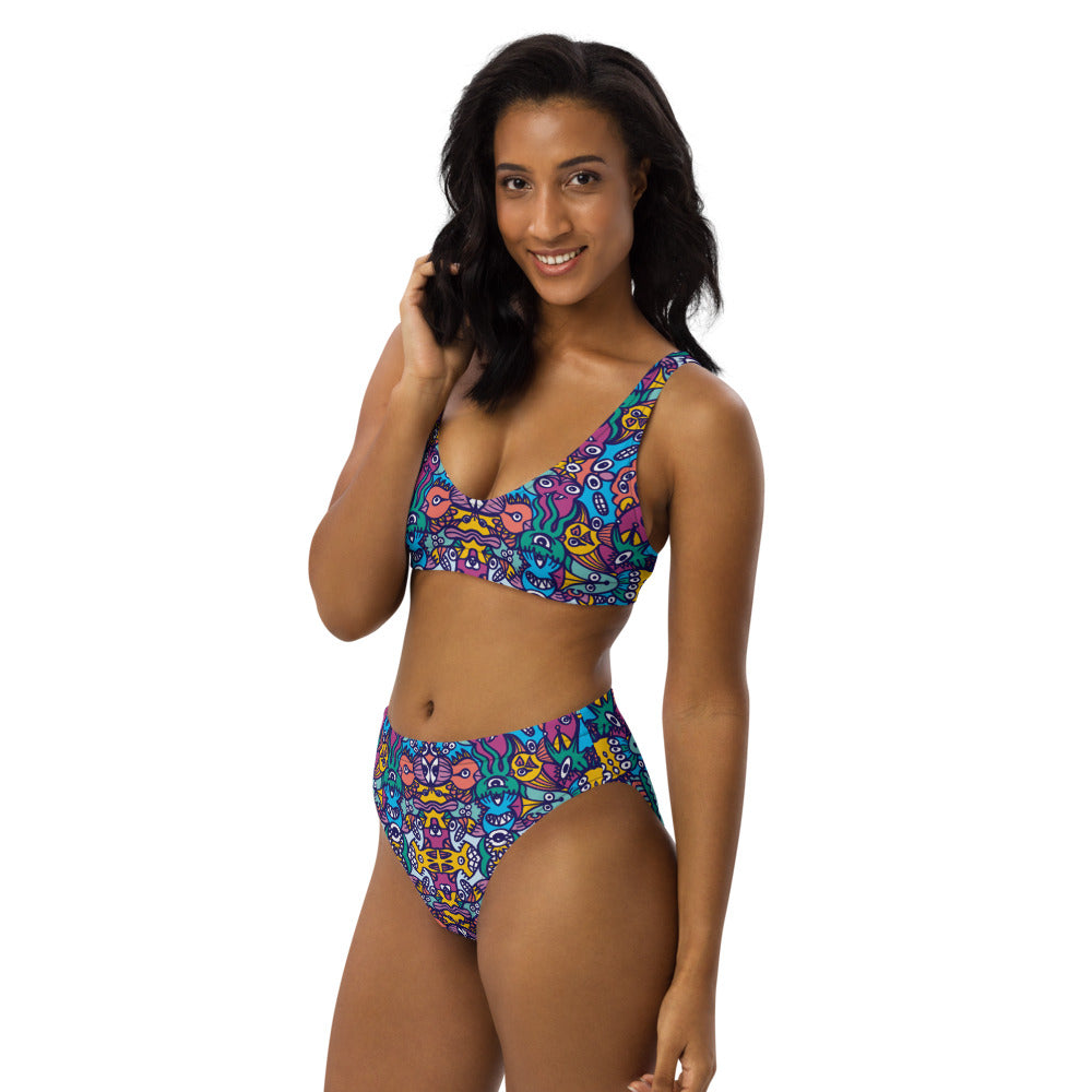 Whimsical design featuring multicolor critters from another world Recycled high-waisted bikini. Side view