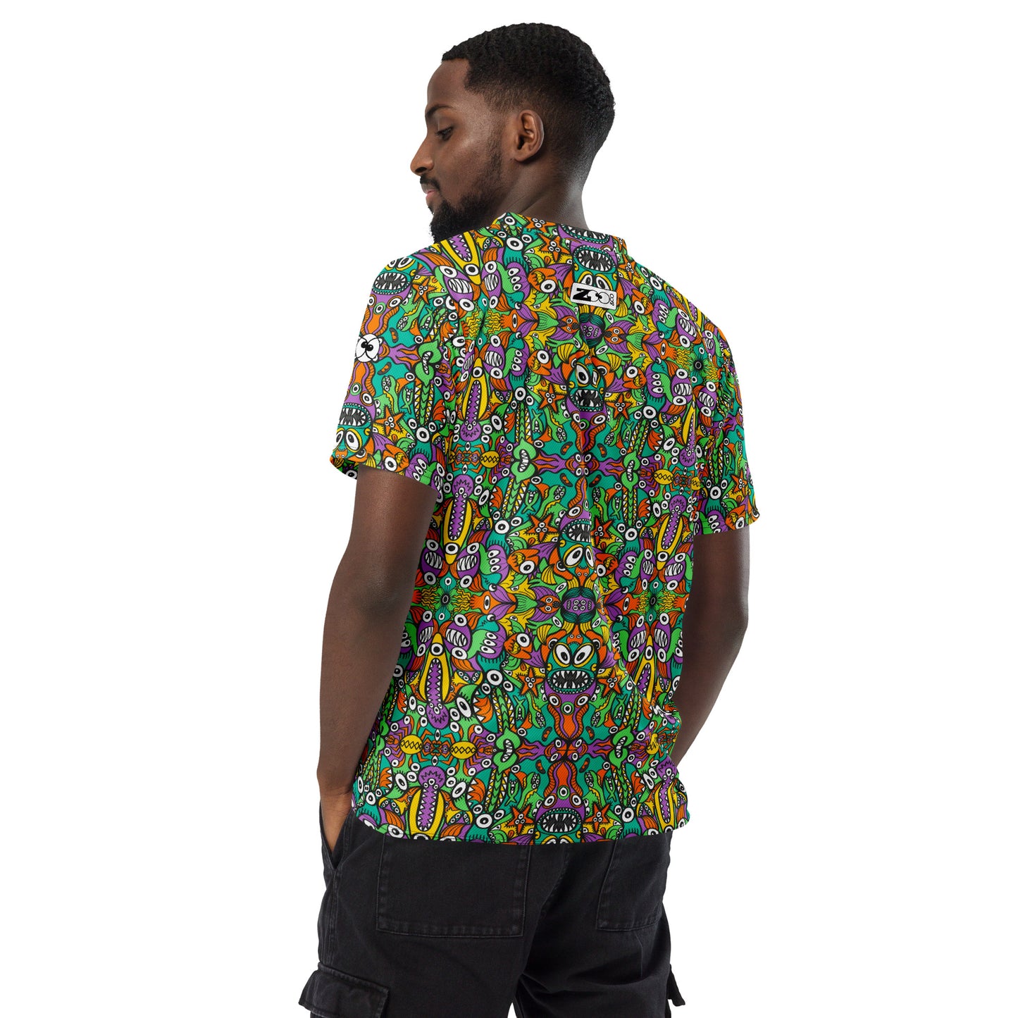The vast ocean is full of doodle critters Recycled unisex sports jersey. Back view
