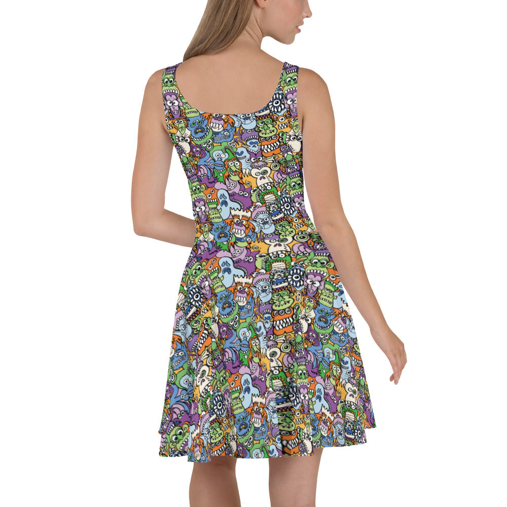 All the spooky Halloween monsters in a pattern design Skater Dress. Back view