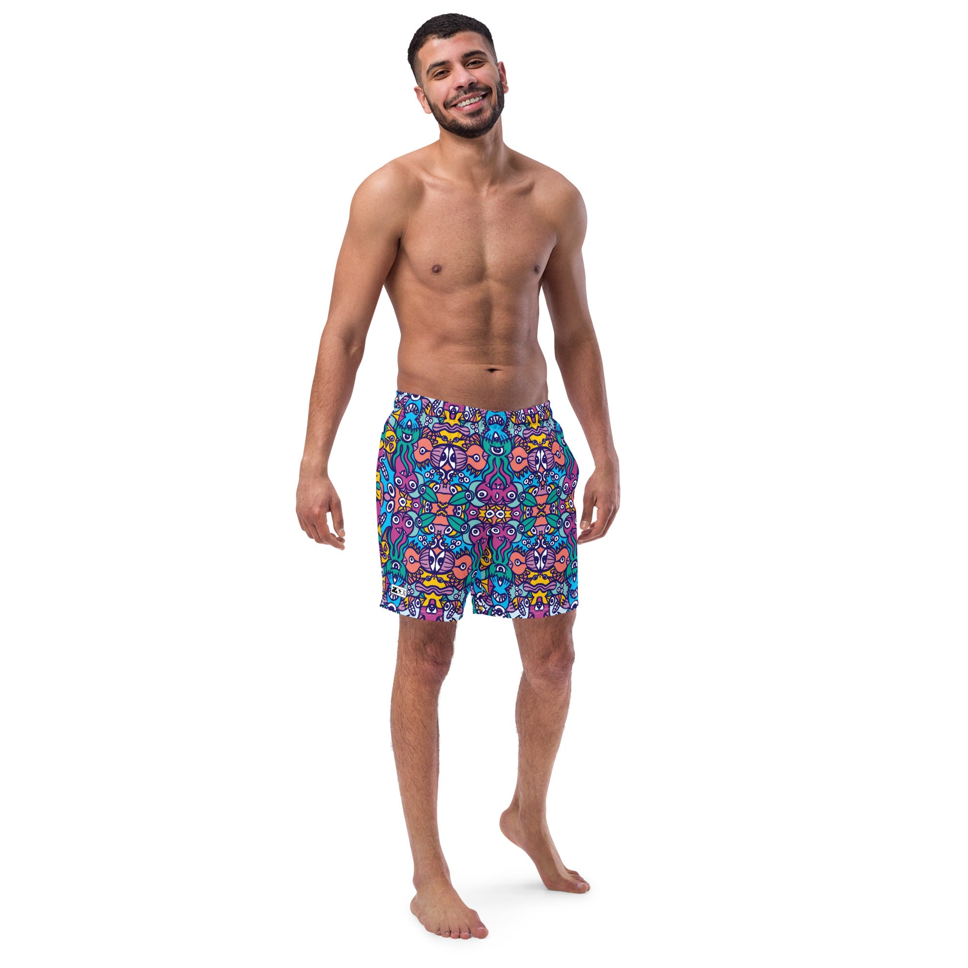 Whimsical design featuring multicolor critters from another world Men's swim trunks. Front view