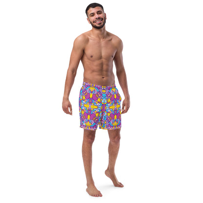 Smiling man wearing Swim Trunks All-over printed with Doodle art compulsion is out of control