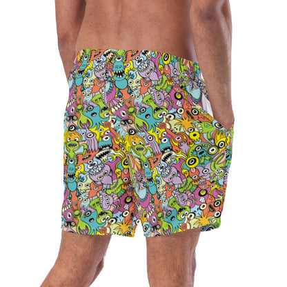 Funny monsters fighting for the best spot for a pattern design Men's swim trunks. Right back view